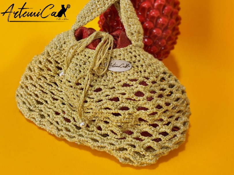 Sabbie Dorate: Borsa a Sacchetto della Magia dei Granelli