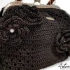 Borsa Incanto Nero: Clic Clac Fatta a Mano all'Uncinetto in Cordino Nero con Fiori - Indossa l'Arte