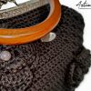 Borsa Incanto Nero: Clic Clac Fatta a Mano all'Uncinetto in Cordino Nero con Fiori - Indossa l'Arte