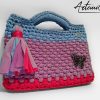 Pochette fatta a mano artigianale lilla con base fucsia e manici azzurro polvere